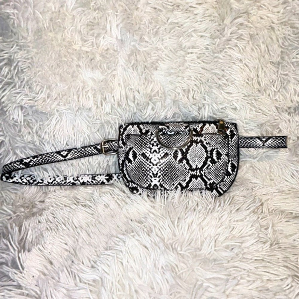Black & white faux leather adjustable fanny pack. NEVER WORN